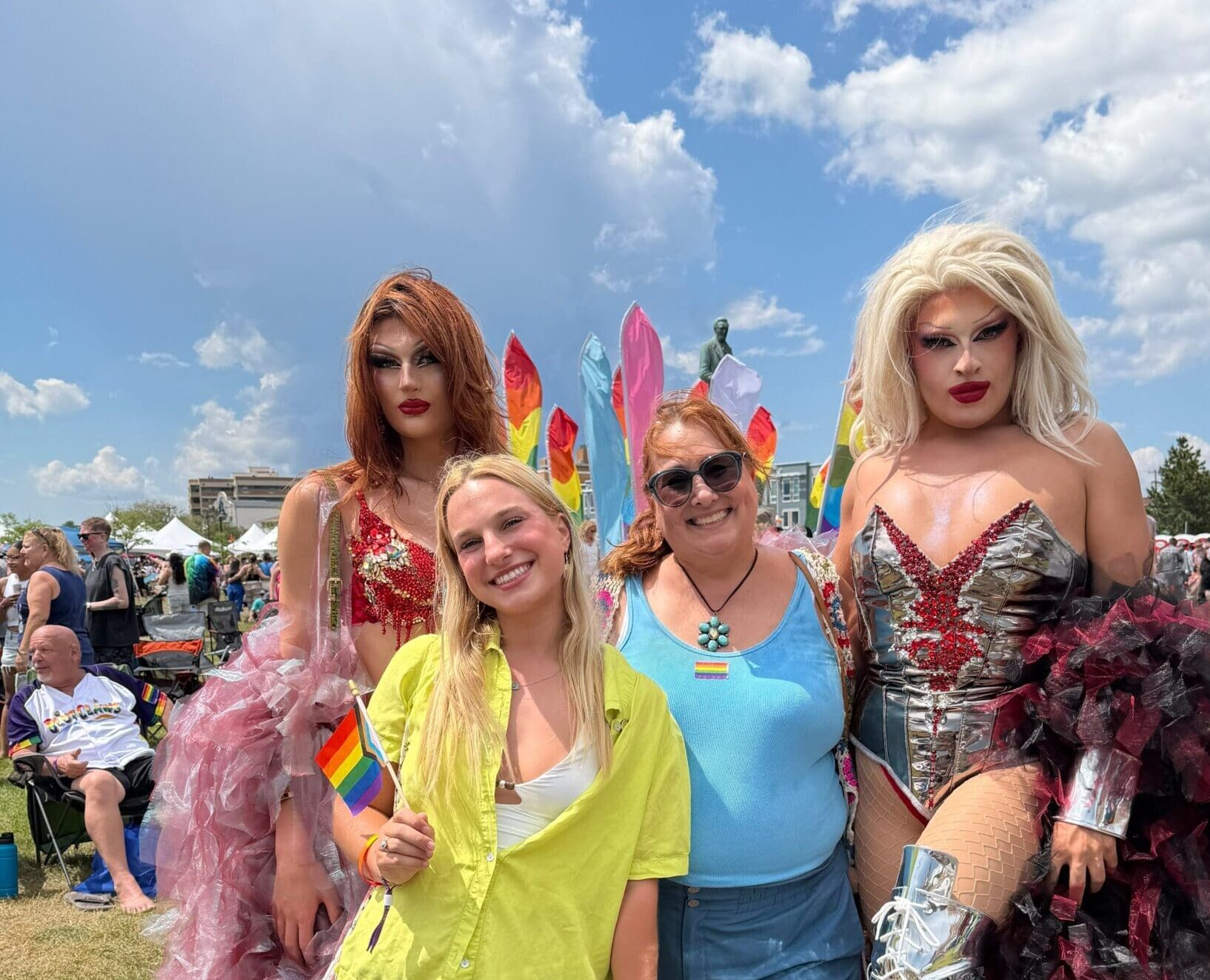 Community members and LGBTQ+ supporters gathered at a Pride celebration, highlighting inclusion, connection, and support for individuals navigating life transitions, relationships, and divorce.